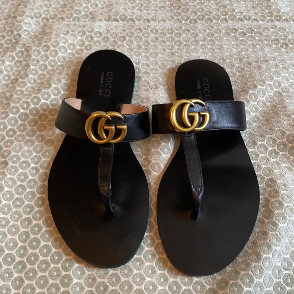 Gucci black flip flops